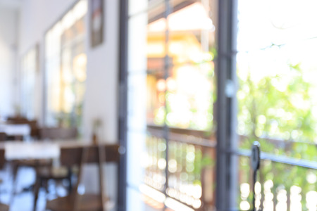 blurred restaurant cafe, white interior vintage contemporary modern styleの写真素材