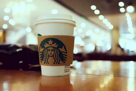 Chiangmai, Thailand, June 29, 2017. Coffee cup of Starbucks global brand in cafe shopのeditorial素材