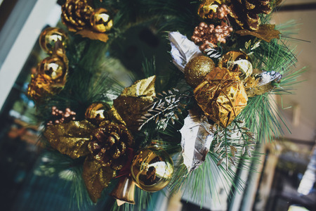 christmas wreath hanging on front doorの写真素材
