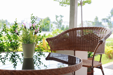 small flower vase decor on black glass tableの写真素材