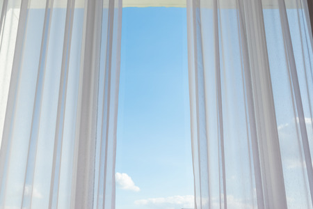 white curtain on glass windowの写真素材