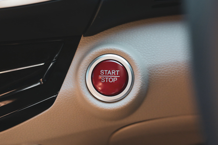 red start and stop button keyless engine on modern vehicle carの写真素材