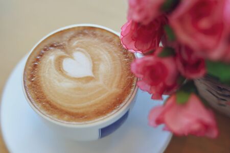 hot latte coffee drink in cafe restaurantの写真素材