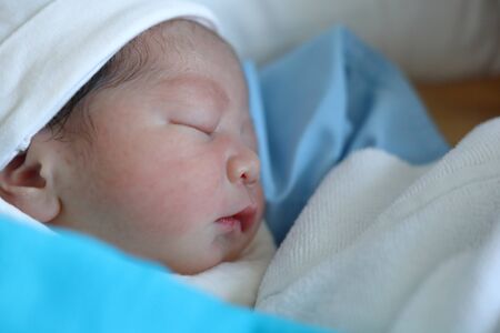 cute baby newborn sleeping sweet dreamの写真素材