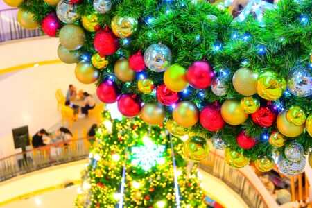 beautiful christmas light and ball ornament decoration in shopping mallの写真素材
