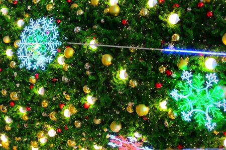 beautiful snowflake led and light ball decoration on christmas tree ornamentの写真素材