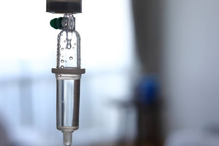 iv infusion saline intravenous injection medicine for healing patient illness in hospitalの写真素材