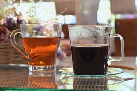 black coffee and hot tea in the morningの写真素材