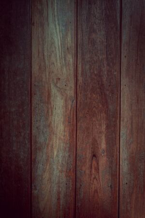 dark wood wall background with shadow vignette borderの写真素材