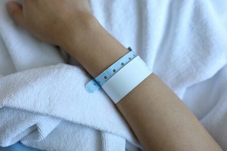 wristband id blank name tags on arm patientの写真素材