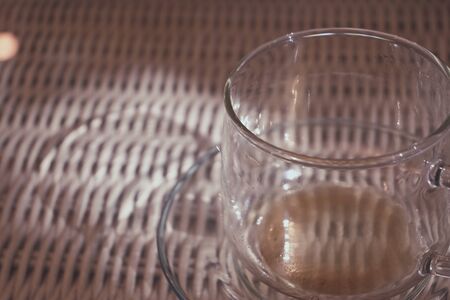 empty glass hot coffe drink on tableの写真素材