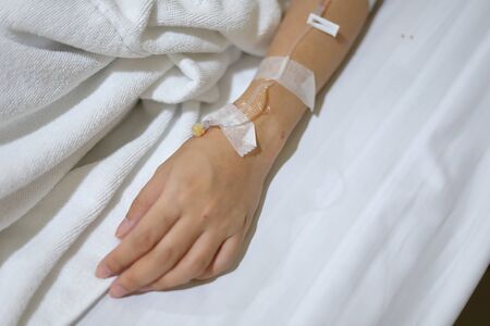 iv infusion intravenous injection of patient illness lying on bed