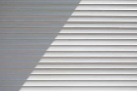 white roller shutter door closed security in modern house