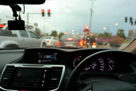 drive vehicle car on urban road, traffic jam in the rainy dayの写真素材