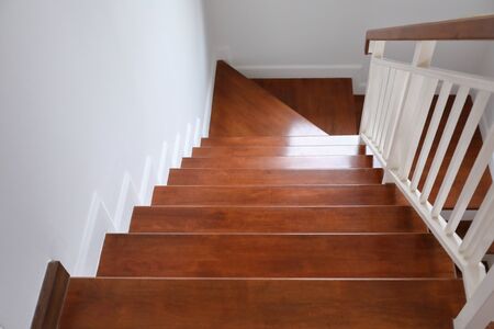 brown wooden stair interior decorated modern style of residential house