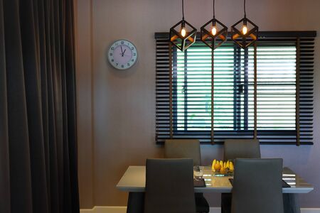 dish ware sets arrange on dining table inside eating room of modern home interiorの写真素材