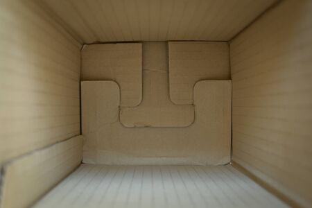 empty inside brown paper box carton for package delivery goodsの写真素材