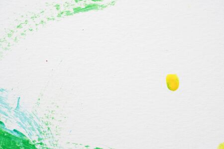 abstract image green and yellow watercolor paint on white paper backgroundの写真素材