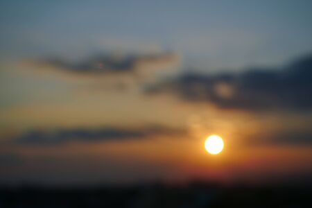image blur beautiful sun light on sunset skyの写真素材