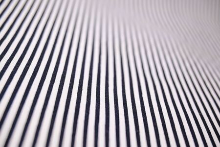 fabric black and white stripe diagonal pattern modern style of fashion trendy cloth texture, abstract imageの写真素材