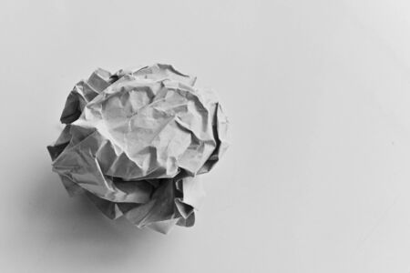 single paper wad ball rubbish in business officeの写真素材