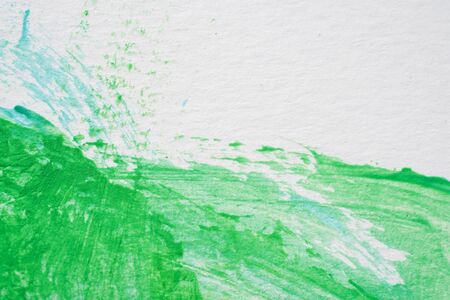 abstract image green watercolor paint on white paper backgroundの写真素材