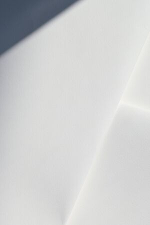 abstract white background, paper page texture for cover design with light and shadowの写真素材