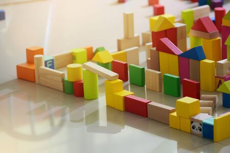 wooden toy block building town for activity of kid play learning development in homeの写真素材