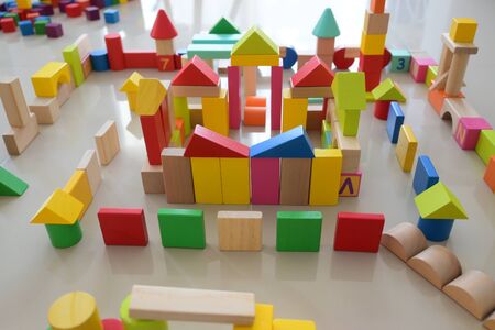 wooden toy block building town for activity of kid play learning development in homeの写真素材