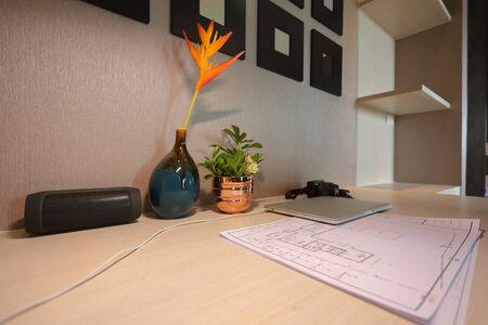 architect paper sketch of blueprint and laptop computer put on desk of table work in business home officeの写真素材