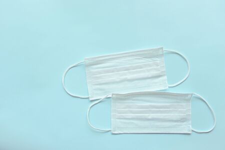 medical hygiene face mask on blue background