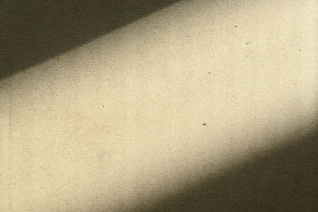 brown paper texture of carton box package for design background with light and shadowの写真素材