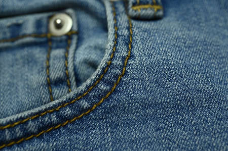 stitch on blue jeans textileの写真素材