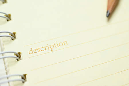 wood pencil on white notebookの写真素材