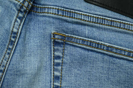 stitch on blue jeans textileの写真素材