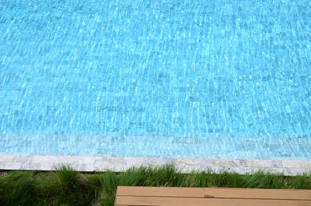 swimming pool in hotel, blue texture background