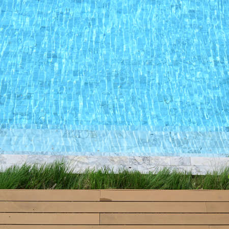 swimming pool in hotel, blue texture backgroundの写真素材