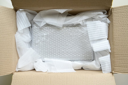 white wrap bubble put in brown box