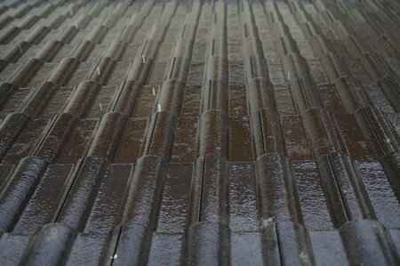 wet roof of house resident, construction industryの写真素材