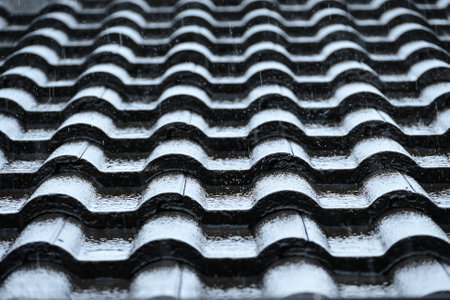 wet roof of house resident, construction industryの写真素材