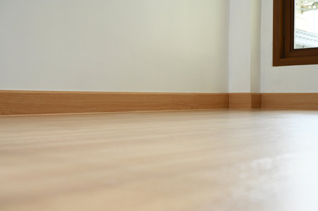 wooden floor and glass window in the roomの写真素材