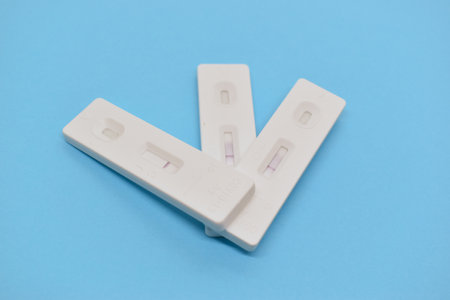 covid test kit on blue background