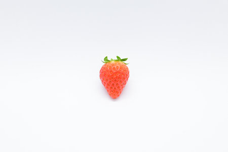 beautiful fresh red strawberry isolated on white backgroundの写真素材