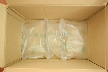 white wrap bubble put in brown box