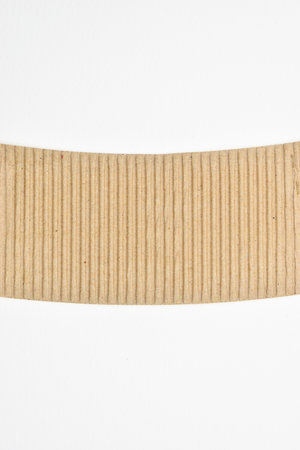 closeup brown paper cardboard texture on white backgroundの写真素材