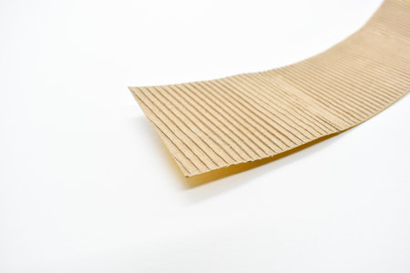 closeup brown paper cardboard texture on white backgroundの写真素材