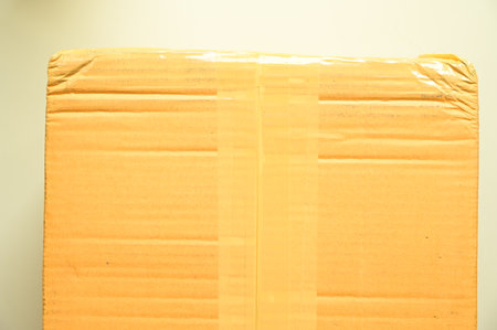 brown cardboard box, paper texture backgroundの写真素材
