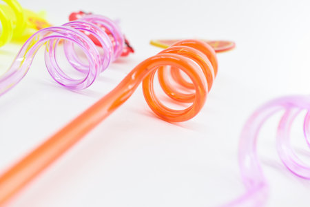 close up colorful drinking staws on white backgroundの写真素材