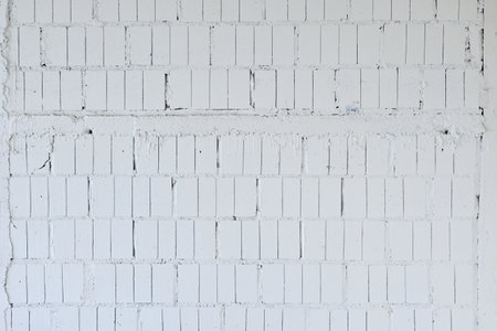 blank white brick cement wall texture background for interior and exterior design, construction industryの写真素材