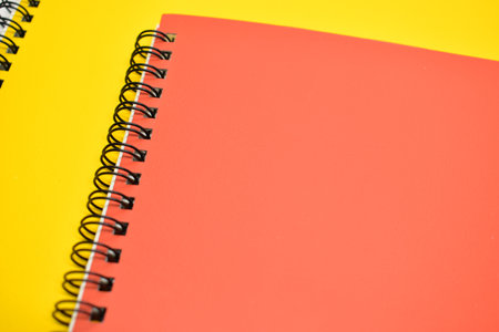 orange and yellow notebook for design, stationery in officeの写真素材